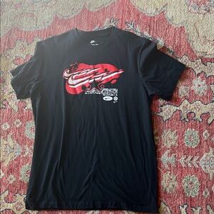 Nike Men's Black Tee with Red Graphic